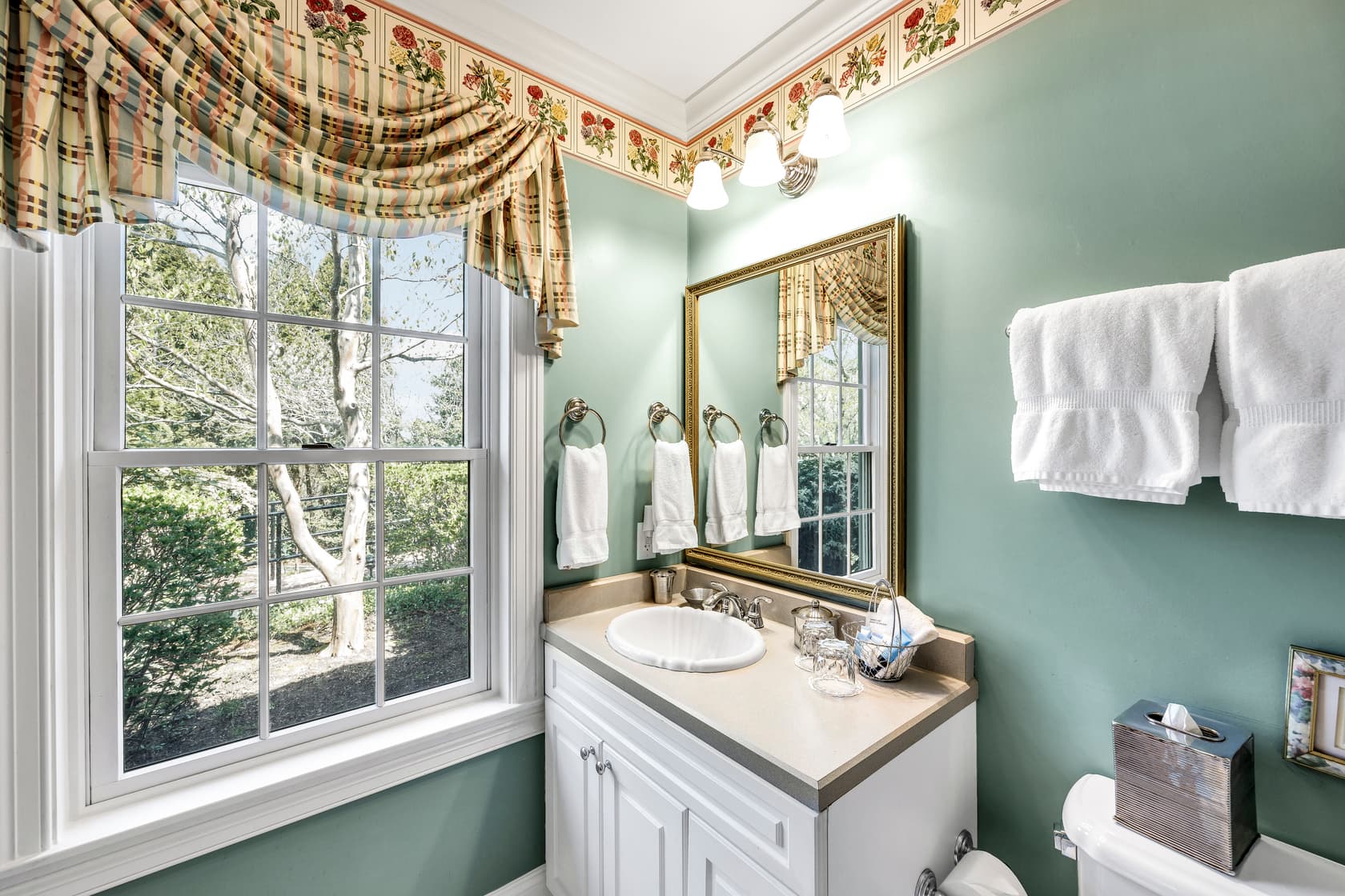 queen bed, fireplace, flatscreen streaming TV, sitting area, dresser