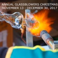 Close up of a demonstration of glass blowing.